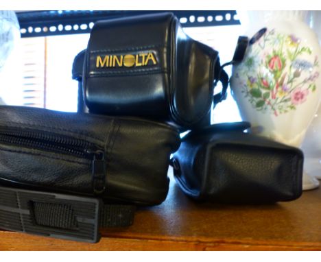 OPTICRON CASED BINOCULARS. Opticron cased 10x42 binoculars, Minolta camera and Olympus camera 