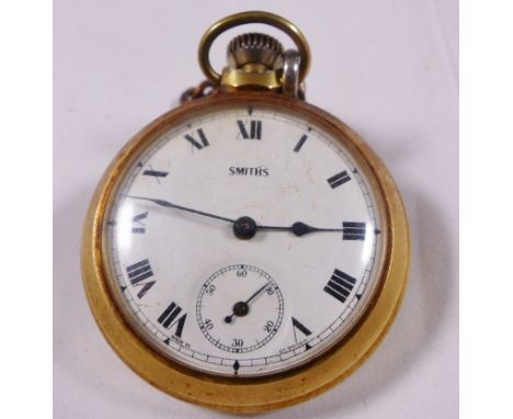 VINTAGE POCKET WATCH. Vintage Smiths brass cased crown wind pocket watch with subsidiary seconds hand to dial, on chain