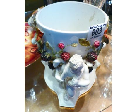 ANTIQUE PLANTER. Antique ceramic floral and cherub planter H ~ 20cm