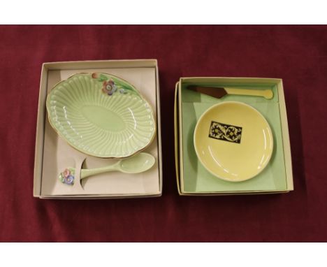 A boxed Crown Devon dish and spoon and a boxed Carltonware butter dish and knife