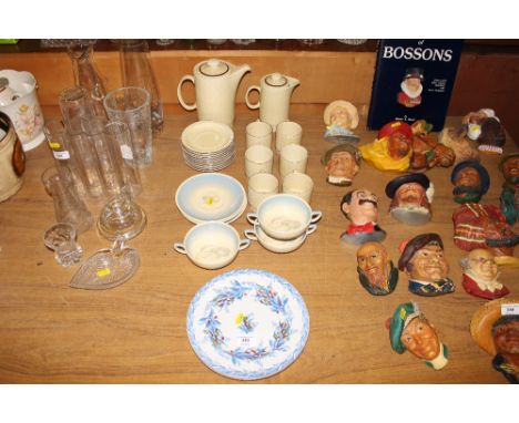 A collection of Susie Cooper soup bowls and saucers; Poole pottery coffee ware; and two French floral decorated plates 