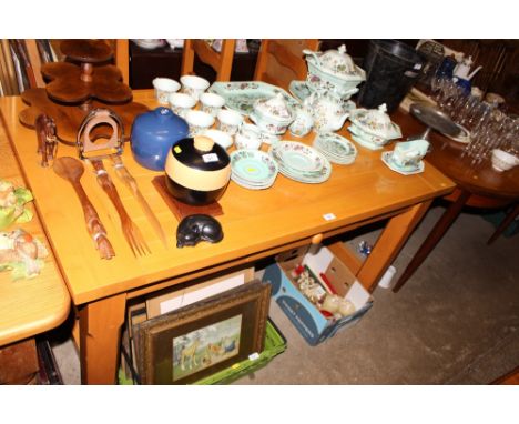 A beech kitchen table and set of four ladder back rush seated chairs