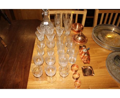 A collection of glassware to include a decanter; drinking glasses; a copper cruet set etc.
