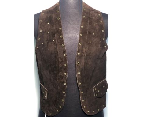 JIMI HENDRIX OWNED AND WORN WAISTCOAT. A mens studded suede waistcoat, likely custom made, owned and worn by Jimi Hendrix cir