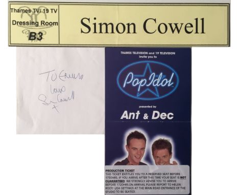 SIMON COWELL AUTOGRAPH. A page (4x4") signed in blue ink in the hand of Simon Cowell, with inscription. Also a production iss