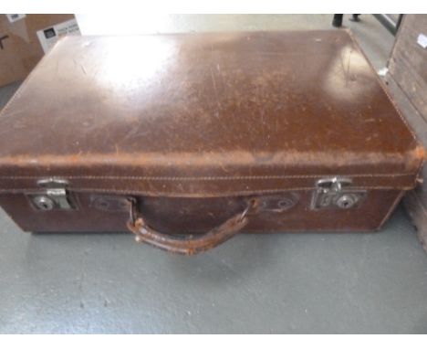 A vintage brown leather suitcase, 56cmW