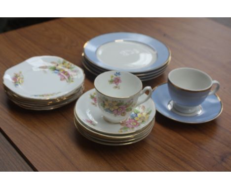 A modern Royal Doulton part tea/dinner set light blue and cream gound with gilt edging including bowls, dinner and side plate