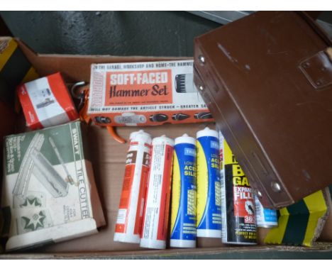 A Thorlite soft face hammer set, mastic gun, tile cutter, and other pieces with an extendable aluminium step ladder, Abru thr