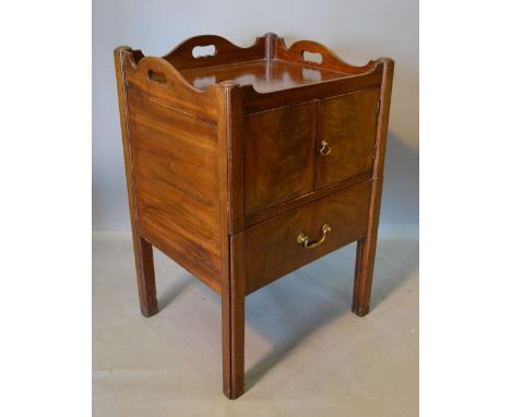 A George III Mahogany Nightstand with a pierced galleried top above two doors and pullout commode with square legs 