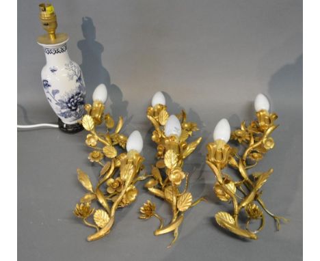 A Set of Three French Gilded Two Branch Wall Lights together with a table lamp 