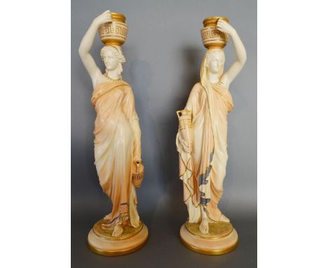 A Pair of Royal Worcester Blush Ivory Large Figures 'The Water Carriers' each in the form of a classical female and highlight