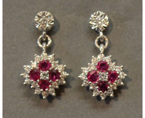 A Pair of 18ct. White Gold Ruby and Diamond Cluster Drop Ear Studs 