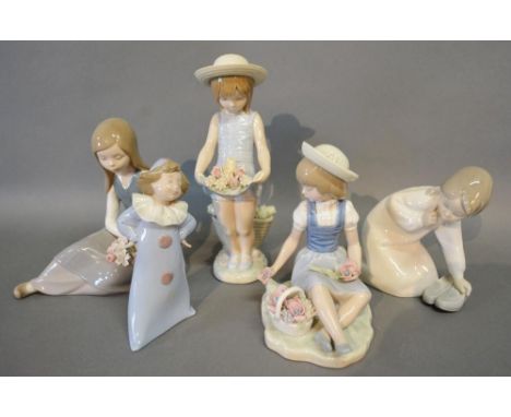 A Lladro Porcelain Model of a Girl with Flowers, together with three other Lladro porcelain models of girls and a Nao porcela