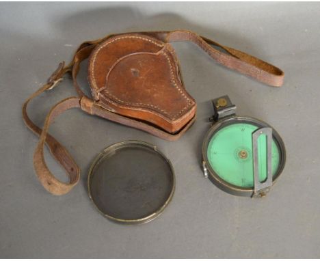 A 19th Century Brass Compass by Troughton & Sims, London, with green card dial and folding side vein within original leather 