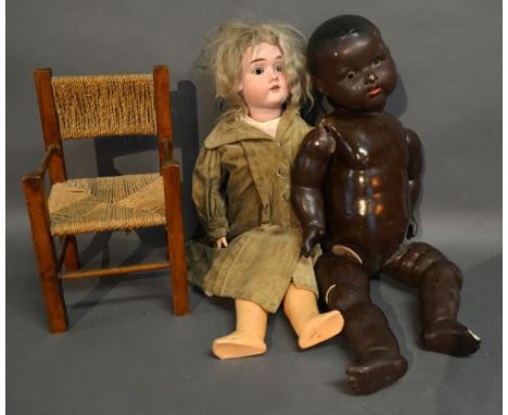 A German Bisque Head Doll by Max Handwerck together with another similar doll and related items 