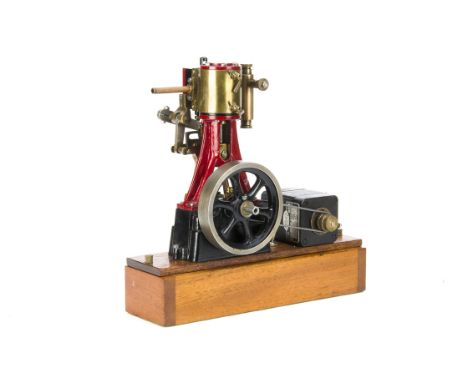 A Single-cylinder reversing vertical Steam Engine, from a Stuart Turner design and castings, finished in black and crimson, o