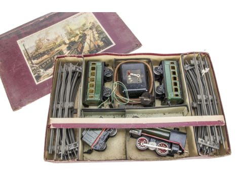A boxed Märklin 0 Gauge 20-volt electric R12880 Steam Passenger Train Set, with lined green 0-4-0 locomotive R12880 and tende