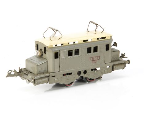 A French Hornby 0 Gauge post-war 20-volt AC electric model in SNCF grey with cream roof, with rubber-stamped red 'SNCF 20v' m