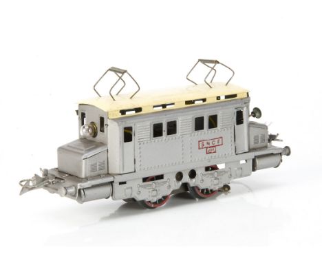 A French Hornby 0 Gauge  post-war 20-volt AC electric model in SNCF silver with cream roof, with rubber-stamped red 'SNCF 20v