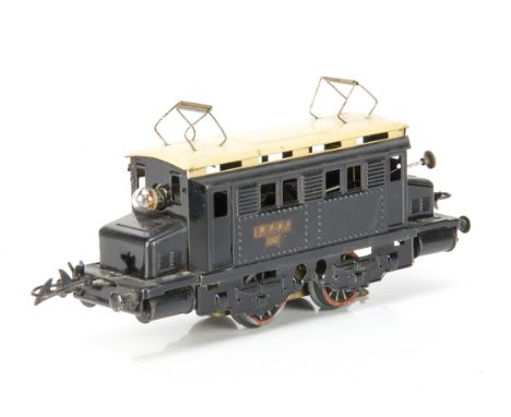 A French Hornby 0 Gauge post-war 20-volt AC electric model in SNCF gloss black with cream roof, with gold/red 'SNCF 20v' tran