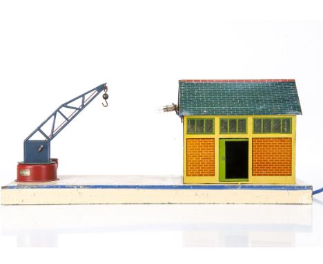 A French Hornby 0 Gauge (tinplate) Goods Platform, believed descibed as a 'Halte No 1', the lithographed red-brick goods shed