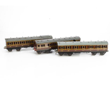 A Bassett-Lowke 0 Gauge 3-rail electric 'Watford-Euston' 3-coach Electric Multiple Unit and spare motors, in lithographed LMS