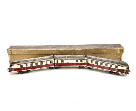 A boxed Märklin 0 Gauge 20-volt electric 'Flying Hamburger' 3-coach Diesel Train, ref TW 12970/3, finished in DR red/cream wi