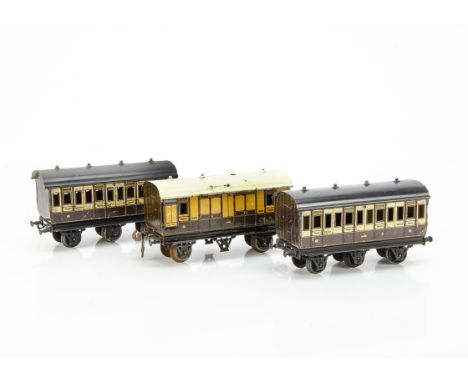 Three Carette for Bassett-Lowke 0 Gauge LNWR 'Clemenson' 6-wheel Coaches, two 1st/3rd compartment coaches no 13212, and full-