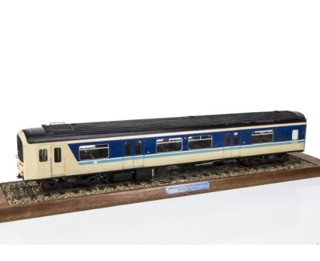 An approximately 2?" Gauge (1/20 scale) static display model class 150 DMU Driving Coach, believed built by BR Staff apprenti