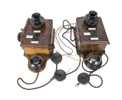 Pair of  Signal Box Wall Mounted Telephones, both oak cased mounted with bells, metal and Bakelite microphones, mounted with 