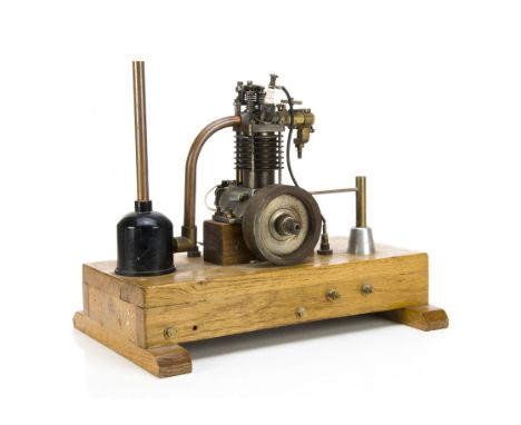 A small Single-cylinder 4-stroke Petrol Engine, of approx 1" bore x 1½" stroke, with fabricated steel cylinder and cylinder h