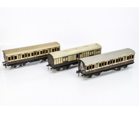 Three Bassett-Lowke Gauge 1 LNWR Bogie Coaches,  two 1st/3rd composites no 1322 and an un-numbered full brake, all in LNWR br