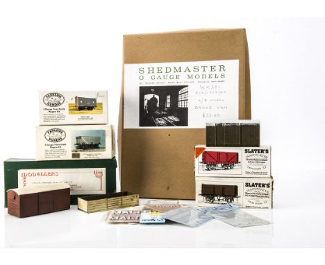 Large collection of unmade and part made 0 Gauge wagon kits and accessories, including Shedmaster GER/BR Brake Van, Slaters G