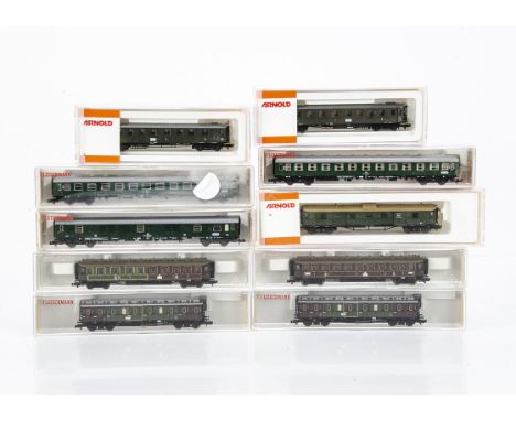 Fleischmann and Arnold N Gauge Continental Coaches, a cased group comprising Fleischmann 8100, 8111 (2), 8842K, 8843K and 889