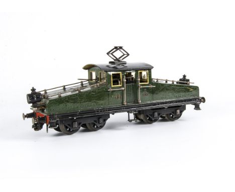 A rare Märklin 0 Gauge 3-rail High-Voltage Electric 'P-O' Steeple Cab Locomotive, in P.O. green livery as No E.1, with dummy 