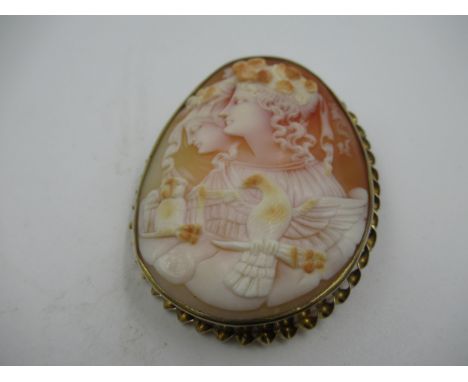 Oval carved shell cameo double portrait brooch in a gold plated mount, 52mm x 41mmGood overall condition 
