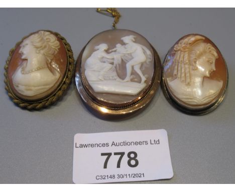 Oval 9ct gold mounted carved shell cameo brooch depicting a classical scene, together with two other carved shell cameo portr