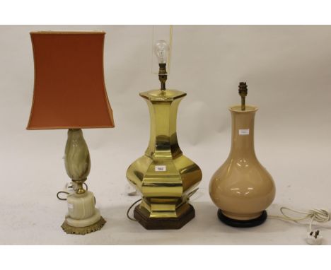 Large hexagonal brass table lamp in oriental style, similar large ceramic table lamp and a brass and onyx table lamp 