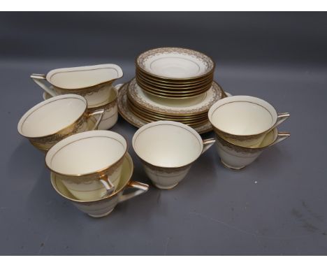 Royal Doulton tea service with gilt borders 