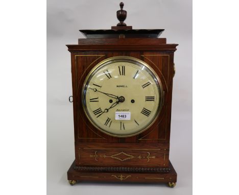 Regency rosewood and cut brass inlaid bracket clock, the pagoda case with brass ring handles and ball feet, the circular pain