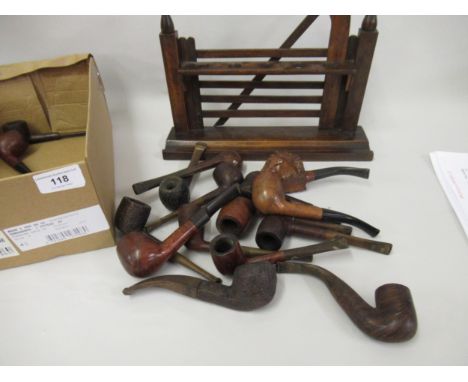 Wooden pipe rack in the form of a gate together with a small quantity of various pipesNo marks or stamps on any of these item