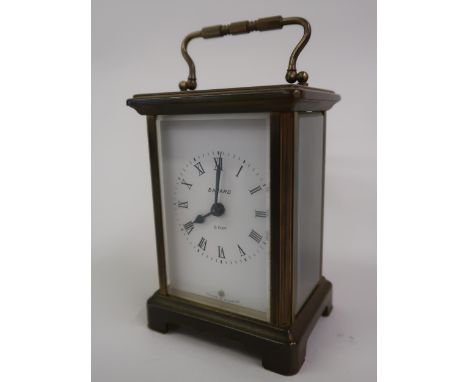 Small French brass cased single train carriage clock by Bayard, together with a cigarette dispenser with clockwork musical mo