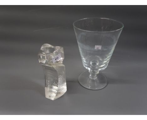 Kosta Boda glass candlestick, 8.5ins high, together with a large glass goblet and a stylised pottery wall plaque 