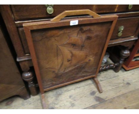 Arts and Crafts oak firescreen inset with an embossed leather panel of a galleon 