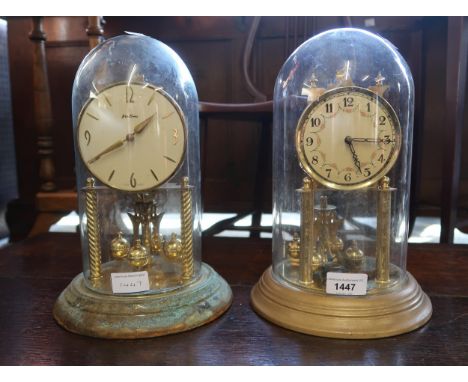 Edwardian brass anniversary clock under glass dome and another later anniversary clock, (at fault) 