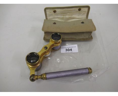 Pair of early 20th Century gilt metal and purple enamel decorated opera glasses, in fitted leather caseIn good condition 