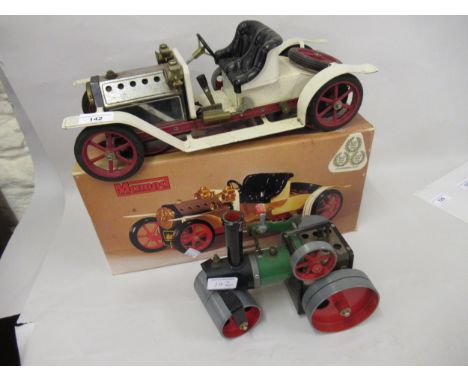 Mamod steam powered model car in original box, together with a similar small traction engine, a roulette wheel in original bo
