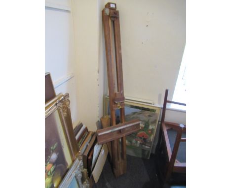 Artist's adjustable easel and an oak octagonal ' Revertable ' card / tea table 