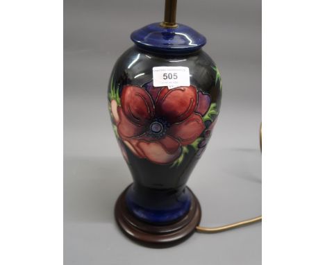 Large modern Moorcroft baluster form table lamp decorated with the Anemone design, 10.25ins high excluding the wooden base an