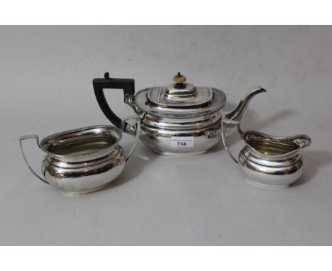 Early 20th Century silver three piece tea service, London 1913, 38 troy ounces 